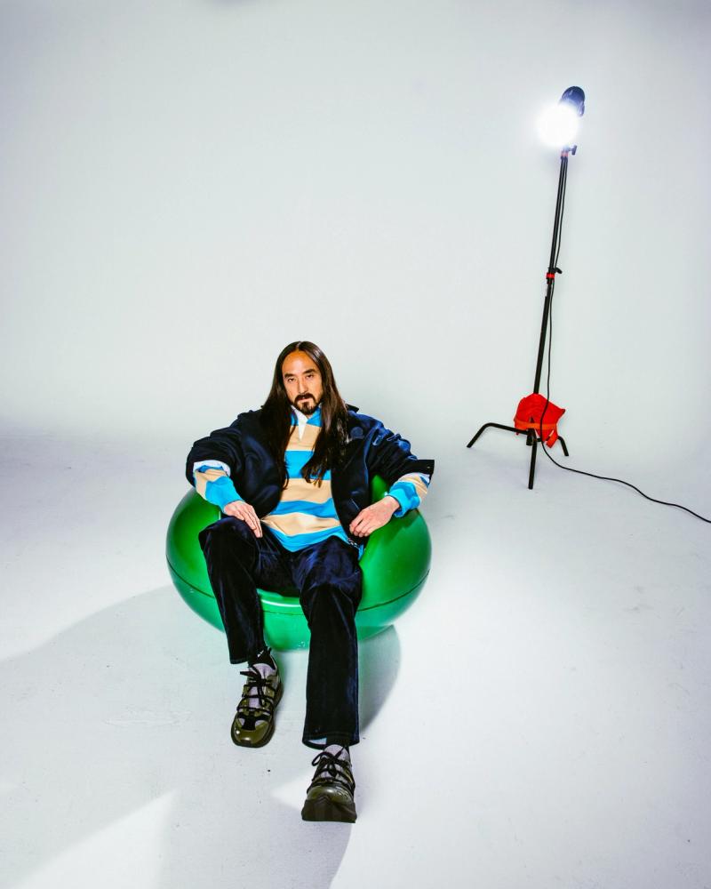 Steve Aoki, wearing a Tommy Hilfiger Jacket, polo and Pants, photographed for Complex and Tommy Hilfiger by photographer Taylor Miller.