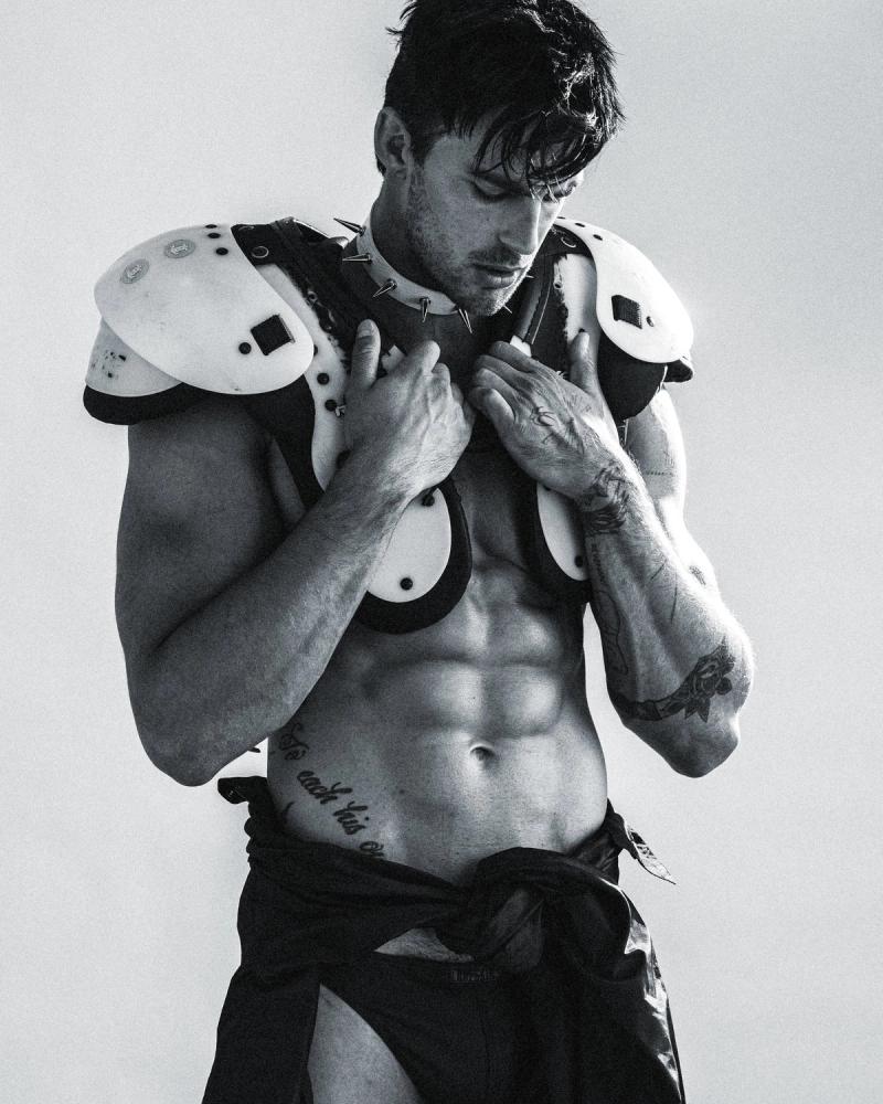 Model Christian Hogue, wearing a vintage football pads, photographed for Numéro Netherlands shot by photographer Taylor Miller.