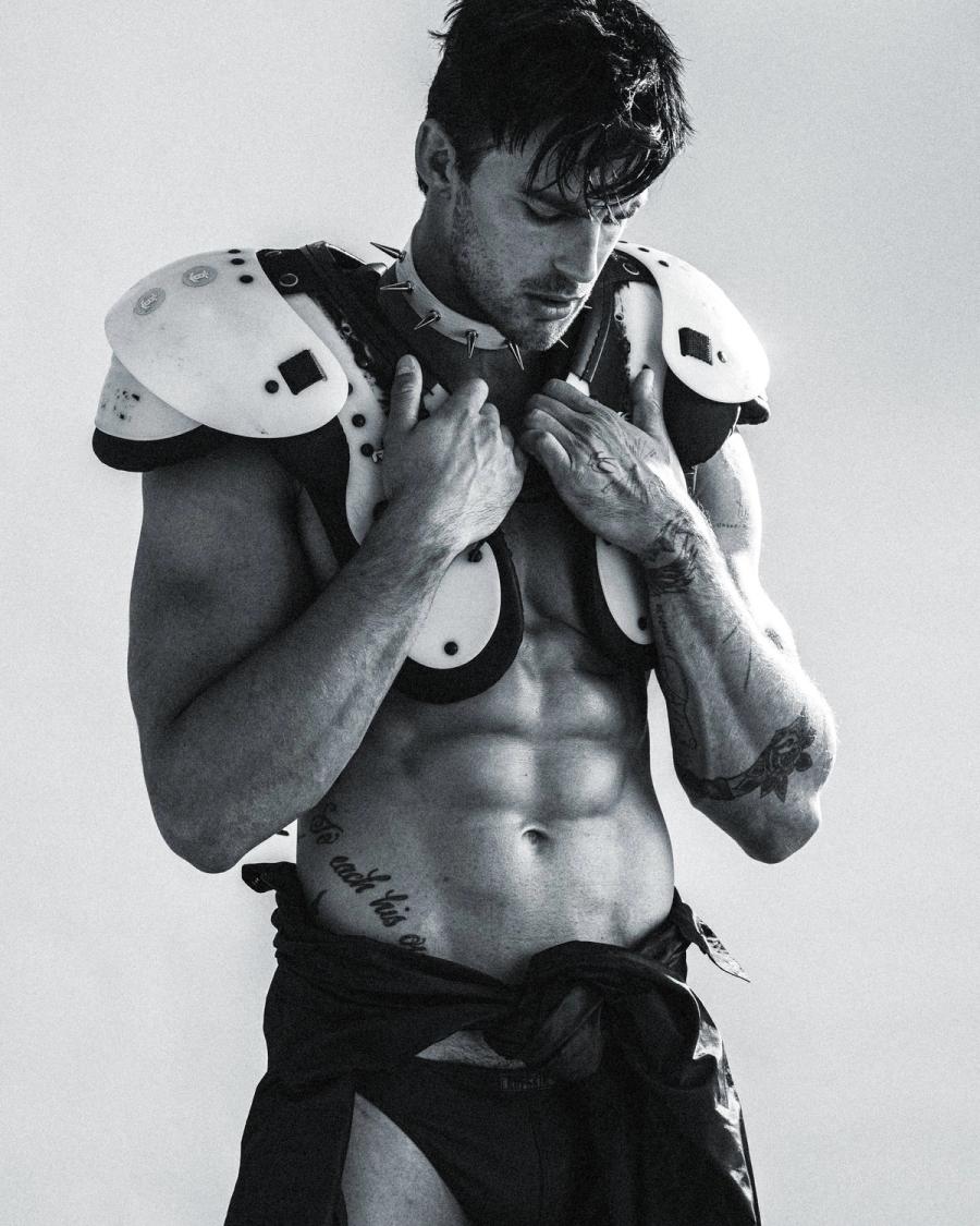 Model Christian Hogue, wearing a vintage football pads, photographed for Numéro Netherlands shot by photographer Taylor Miller.