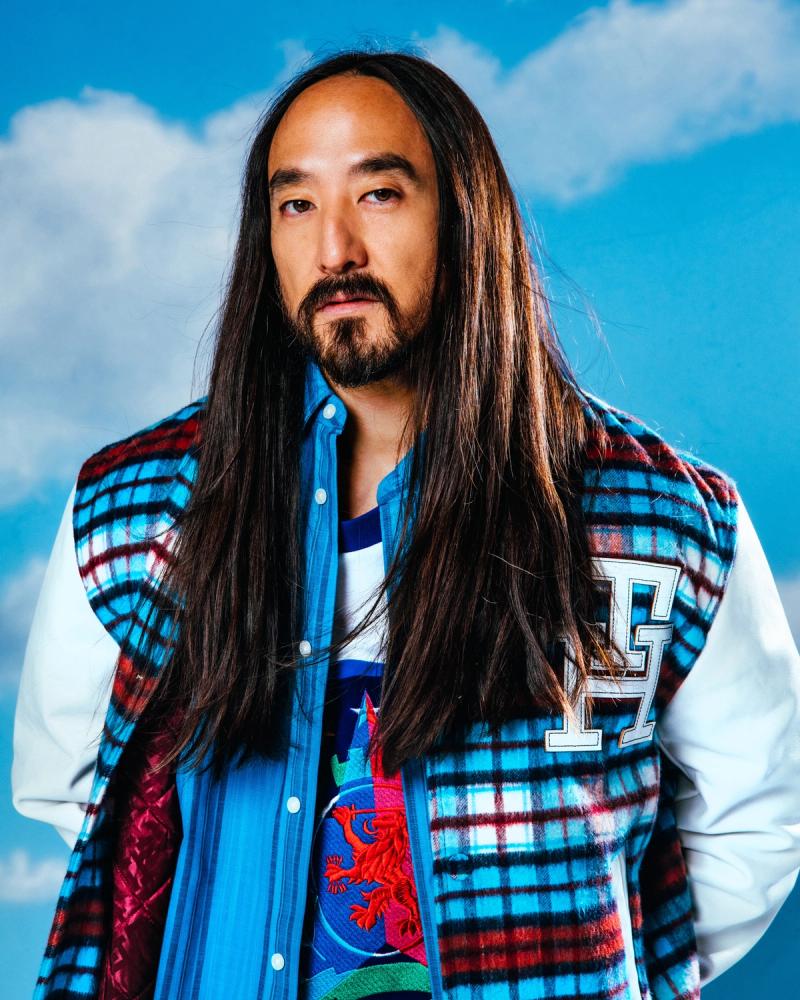 Steve Aoki, wearing a Tommy Hilfiger Jacket and sweater, photographed for Complex and Tommy Hilfiger by photographer Taylor Miller.