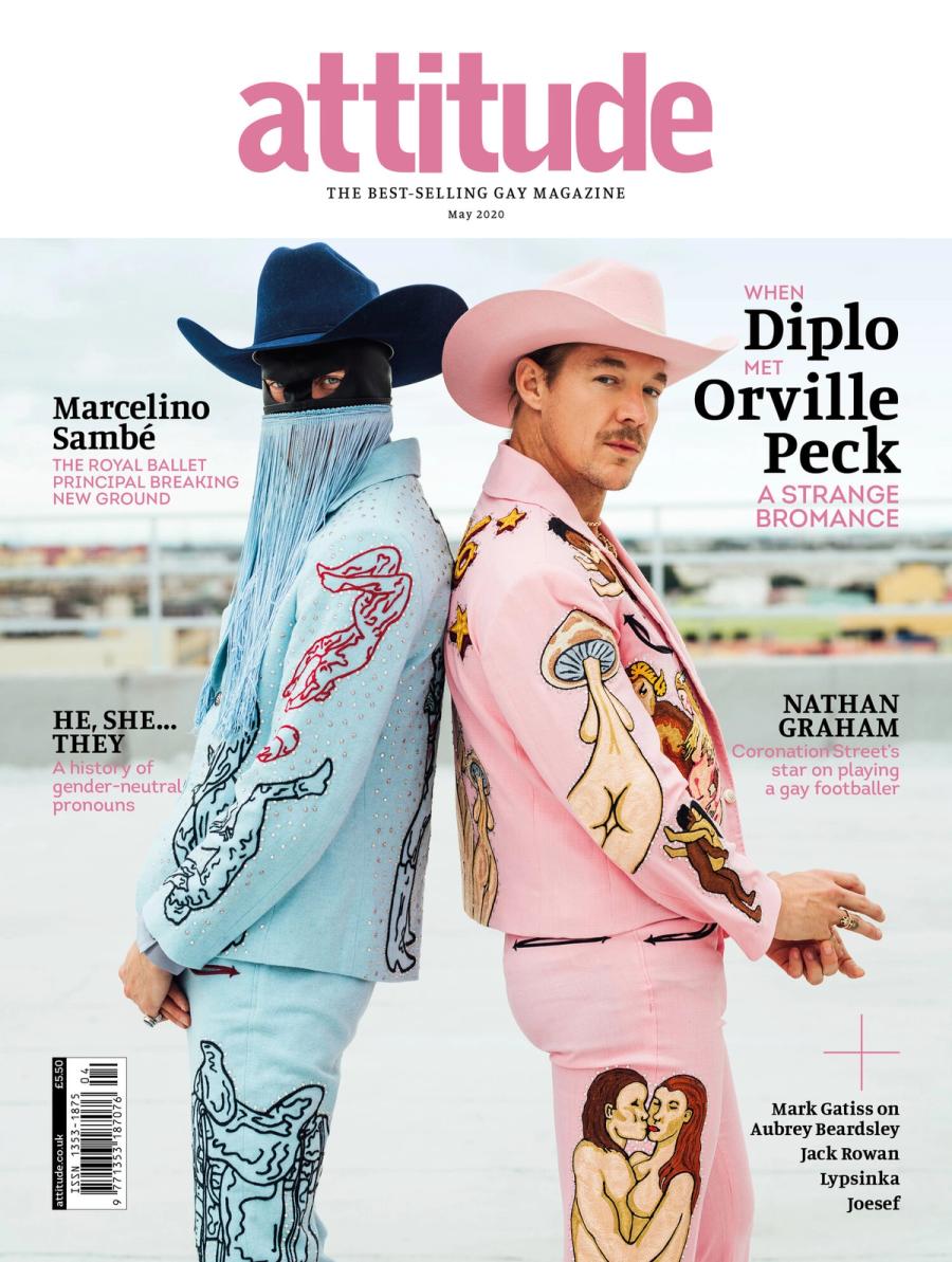 Musicians Orville Peck and Diplo, wearing matching suits, photographed for Attitude Magazine by celebrity and fashion photographer Taylor Miller. 