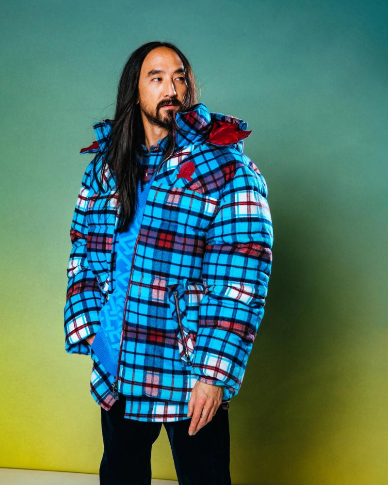 Steve Aoki, wearing a Tommy Hilfiger Puffy Jacket and Pants, photographed for Complex and Tommy Hilfiger by photographer Taylor Miller.