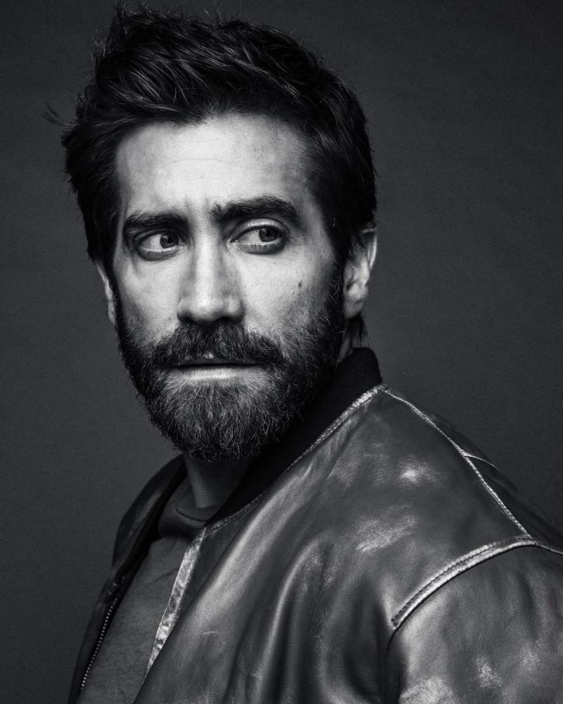 Actor Jake Gyllenhaal wearing a leather jacket and posing looking over his shoulder photographed in New York City by fashion and celebrity photographer Taylor Miller who is located in Brooklyn, NY. 