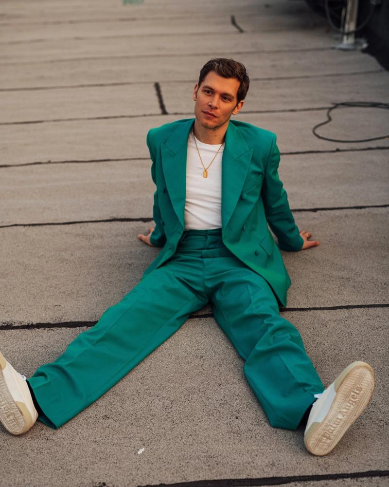 Actor Joseph Morgan, wearing a teal suit, photographed for Numéro Netherlands shot by photographer Taylor Miller.