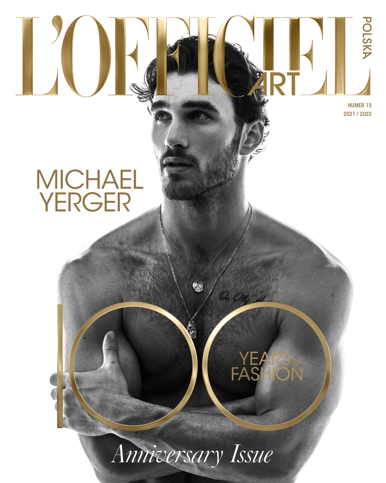 Model Michael Yerger, wearing a gold chain, photographed for L'OFFICIEL Hommes magazine by photographer Taylor Miller.
