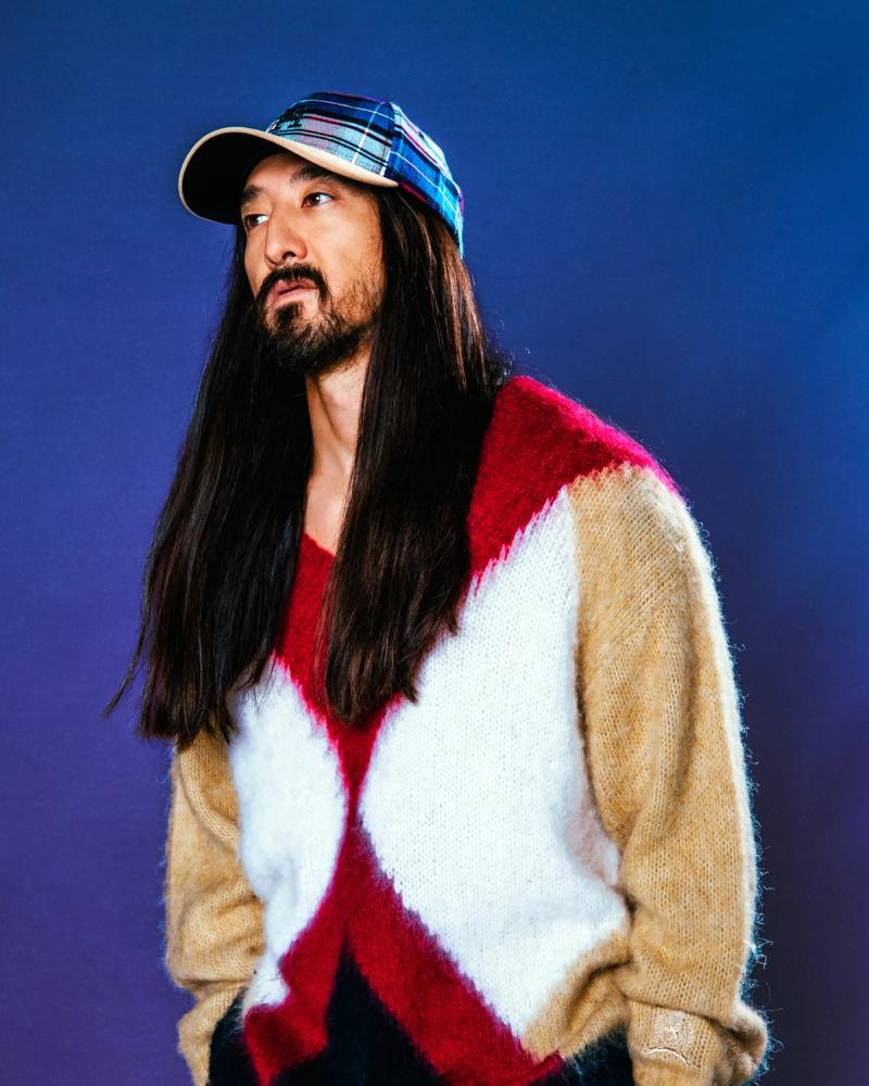 Steve Aoki, wearing a Tommy Hilfiger Sweater and Hat, photographed for Complex and Tommy Hilfiger by photographer Taylor Miller.