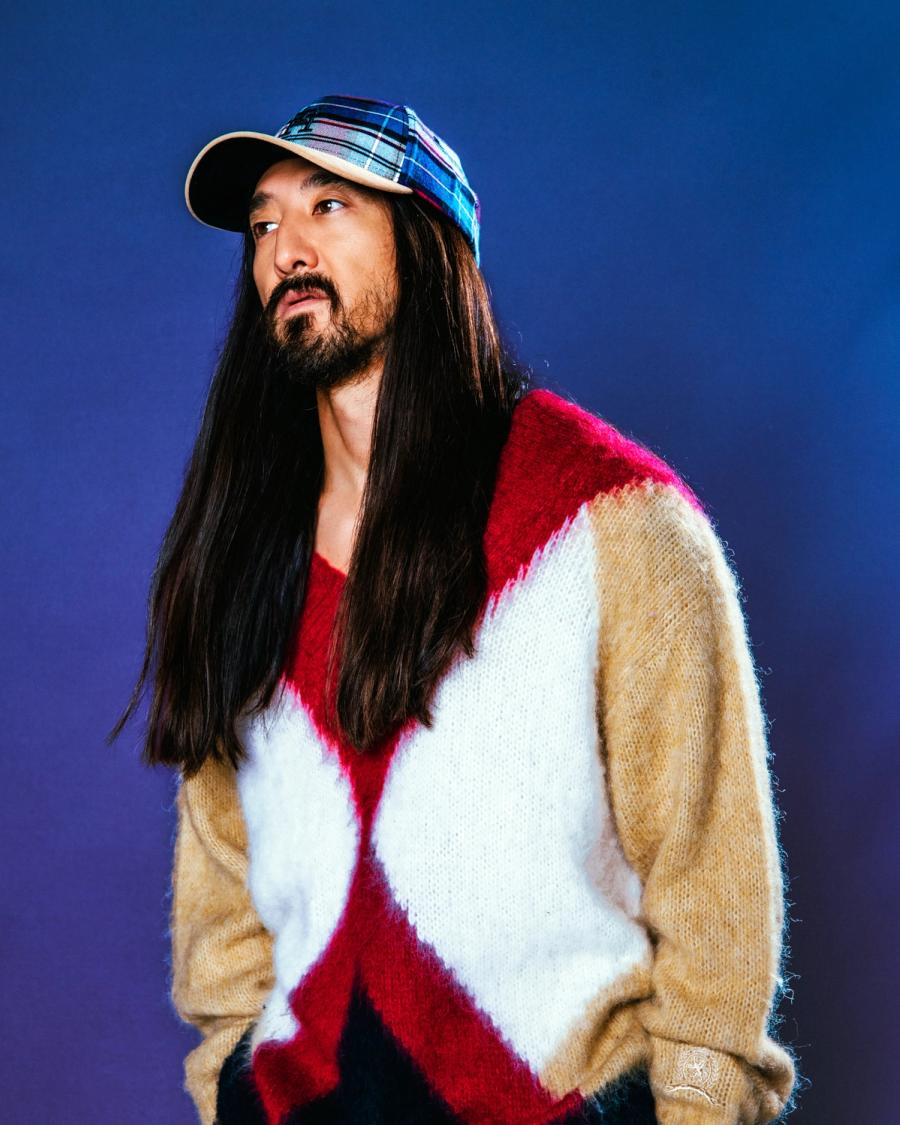 Steve Aoki, wearing a Tommy Hilfiger Sweater and Hat, photographed for Complex and Tommy Hilfiger by photographer Taylor Miller.
