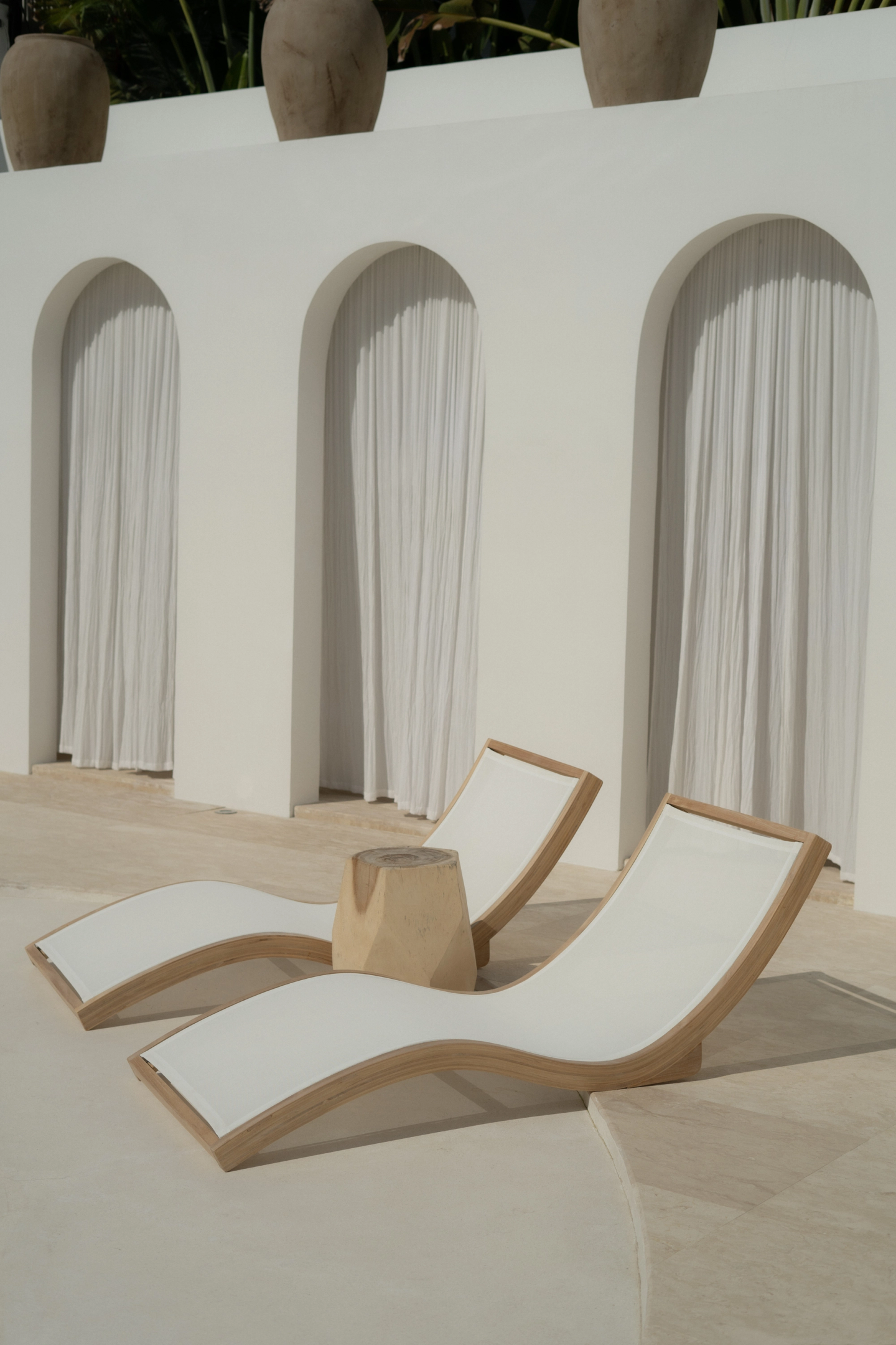 Sunbeds at the pool area in Maja Canggu