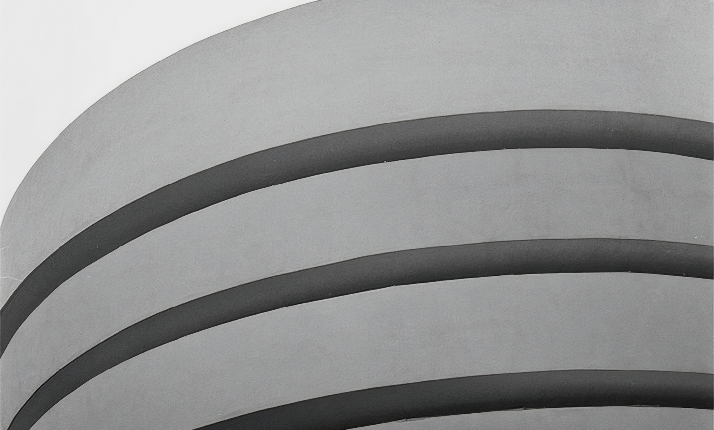 Close-up of modern architectural curves in muted grey tones for OREUM branding; minimalist visual identity and website branding by Eeze Studio for contemporary hospitality and lifestyle brands.