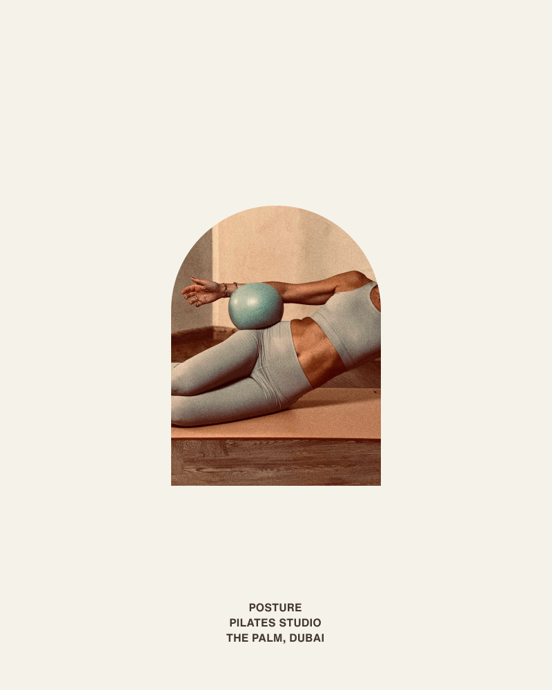 Posture Pilates Poster Visual – Movement and Balance, The Palm Dubai Reformer studio view with arched columns and wall-mounted “REFORMER” sign, illustrating Posture Pilates interior signage and brand system in Dubai