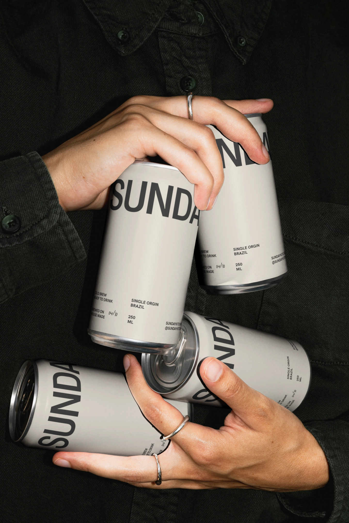 Mockup of the branding for Sunday Kitchen in coffee cans. Mockup of the branding for Sunday Kitchen in coffee cans. Design by eeze studio