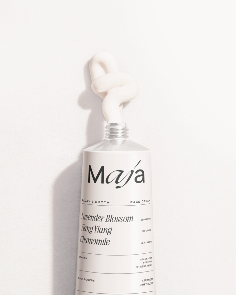 Tube packaging design for MAJA Bali featuring minimalist branding and soft neutral tones.