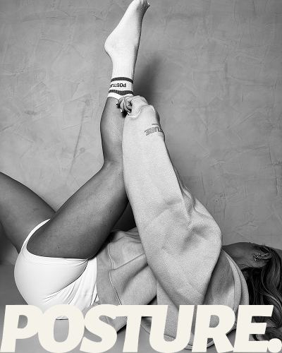 Posture Pilates Campaign Poster – Monochrome Studio Rebrand Monochrome campaign poster of reclining pilates pose with bold Posture wordmark, created for Posture Pilates rebranding and web design on The Palm Dubai