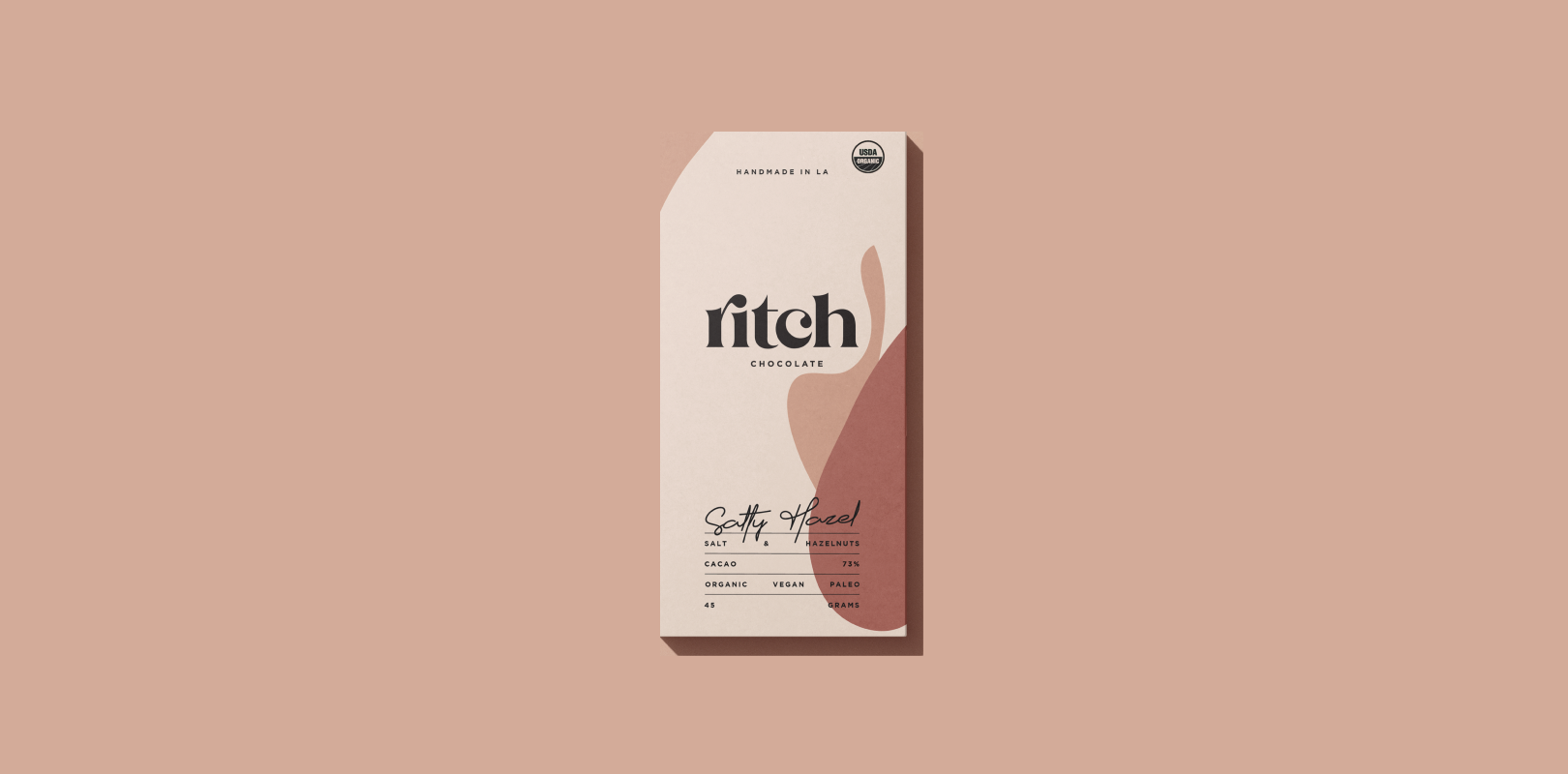 Ritch Handmade Chocolate – Salty Hazed Packaging Design by eeze studio Modern chocolate packaging for Ritch Handmade Chocolate’s Salty Hazed bar, designed with abstract elements and earthy hues.
