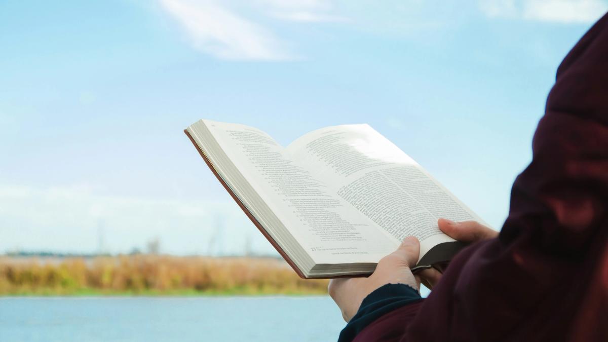 Holding a Bible