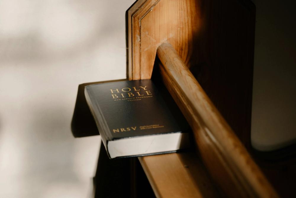 An NRSV Bible on a Church Pew