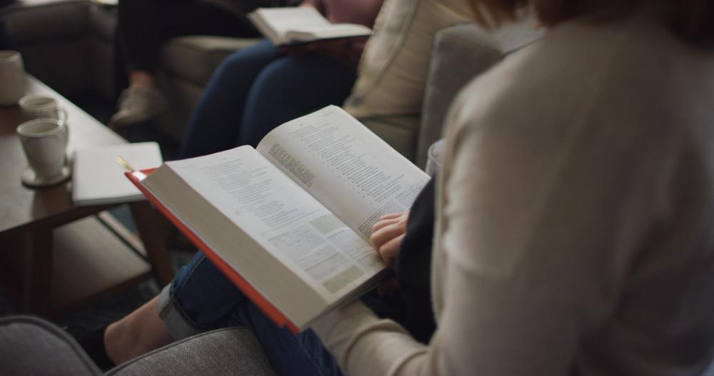 A woman reading an ESV Study Bible