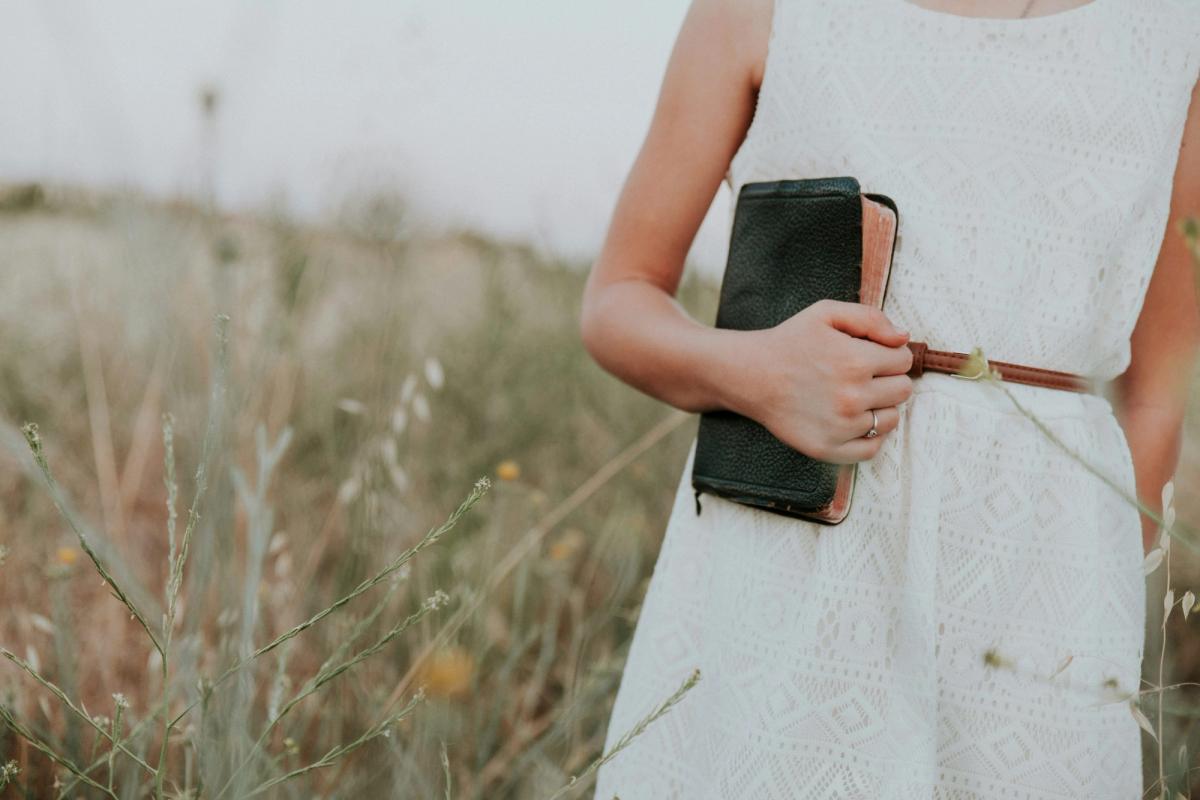 Woman holding a Bible