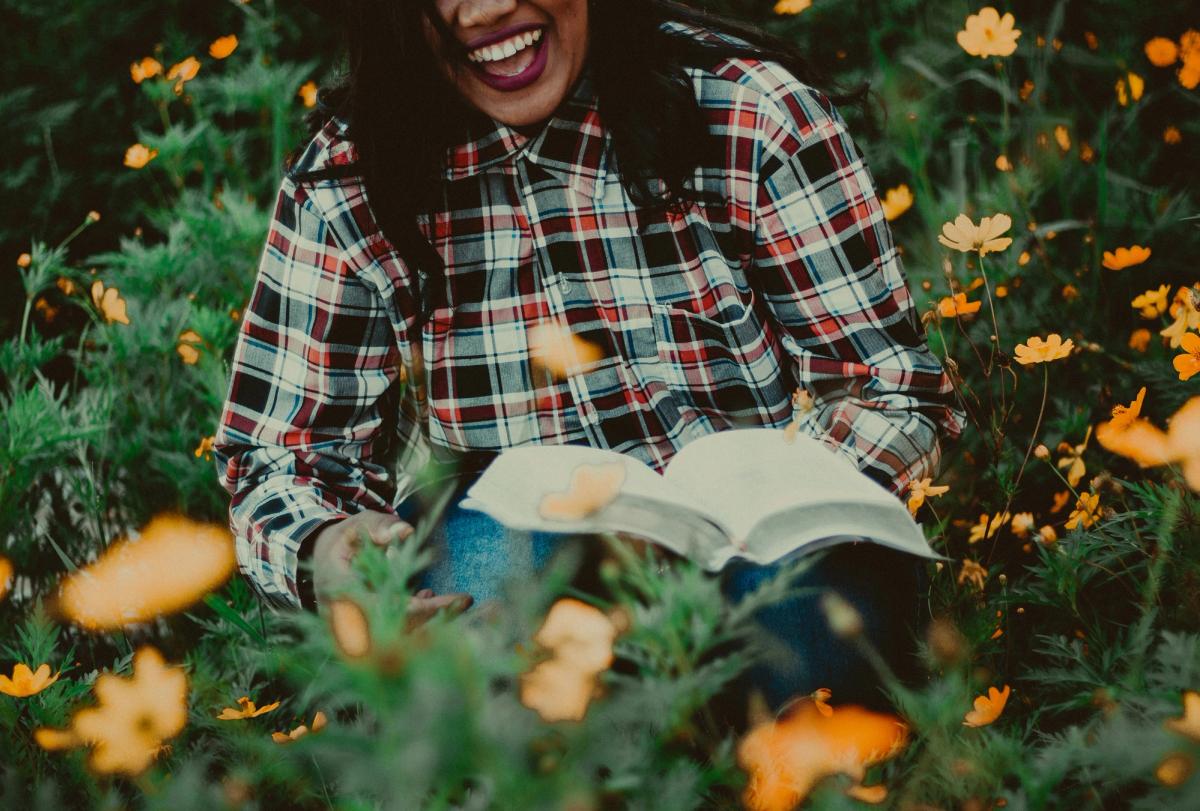 Smiling Holding a Bible