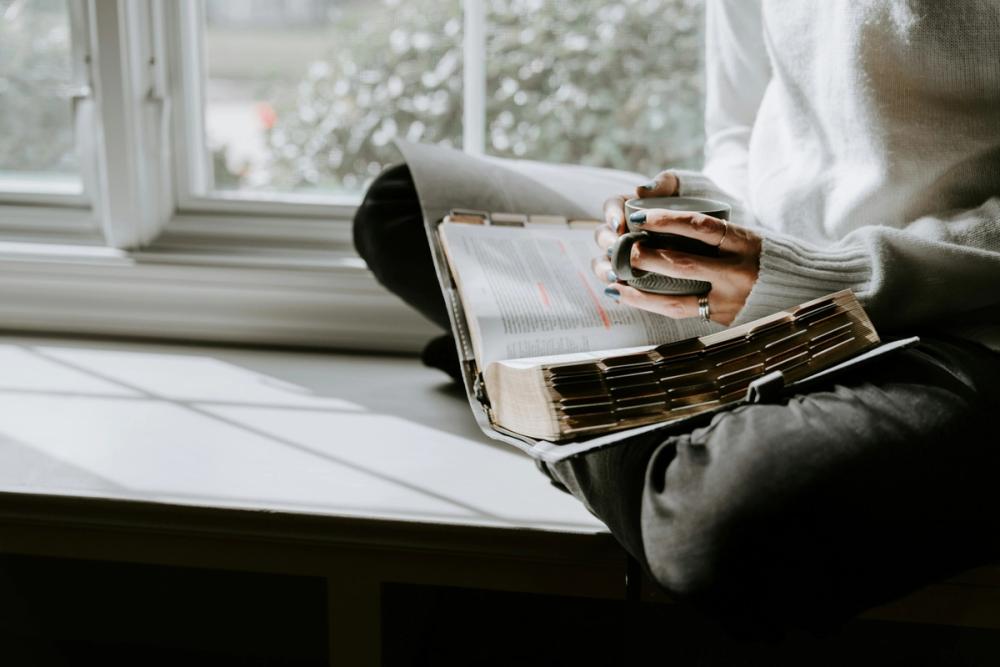 Cosy Bible Reading with a Coffee by a Window