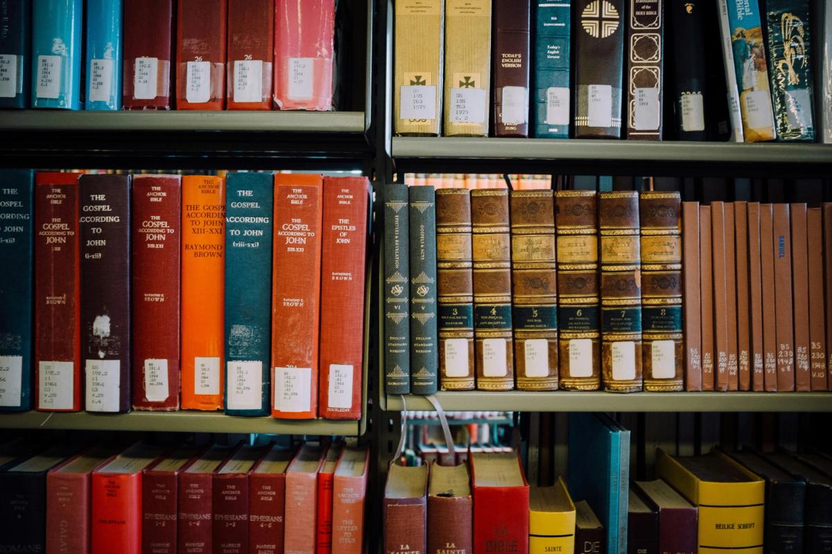 Bibles and Theology Books on a Shelf