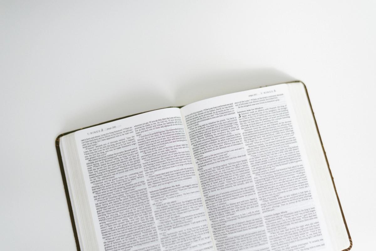 An open Bible on a white background