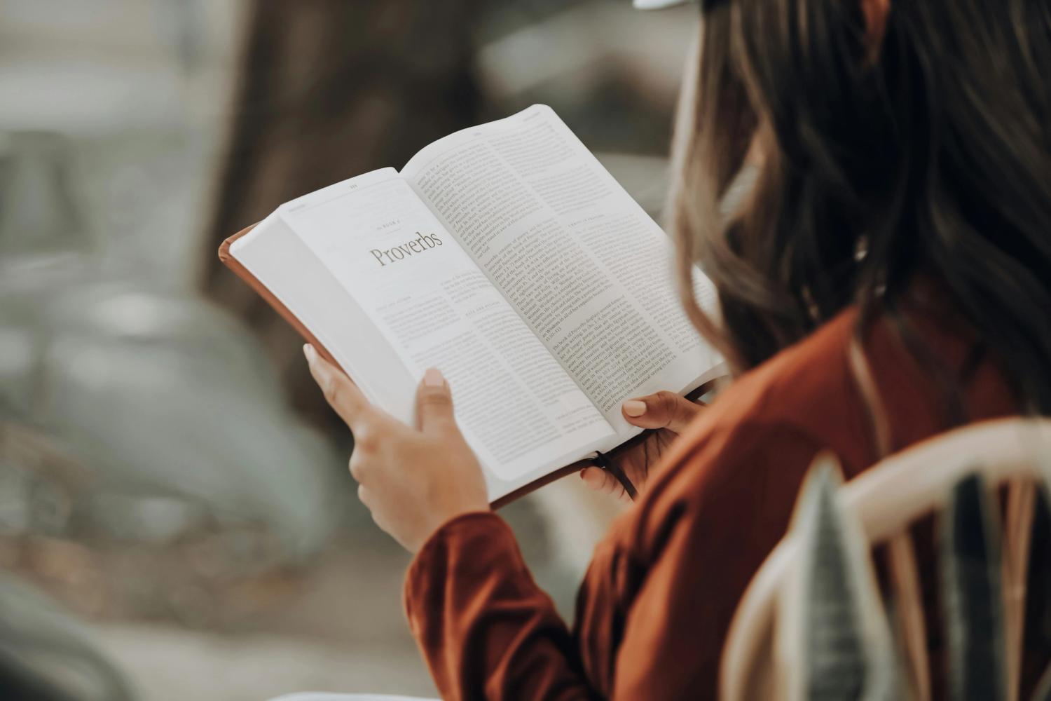 Woman reading a beautiful bible
