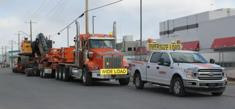 Green Line Excavator Haul – Stampede Grounds