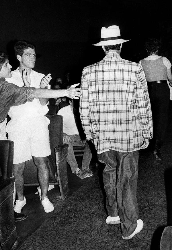 Fan touching David Byrne, Inwood Movie Theater, Dallas, Texas 1986