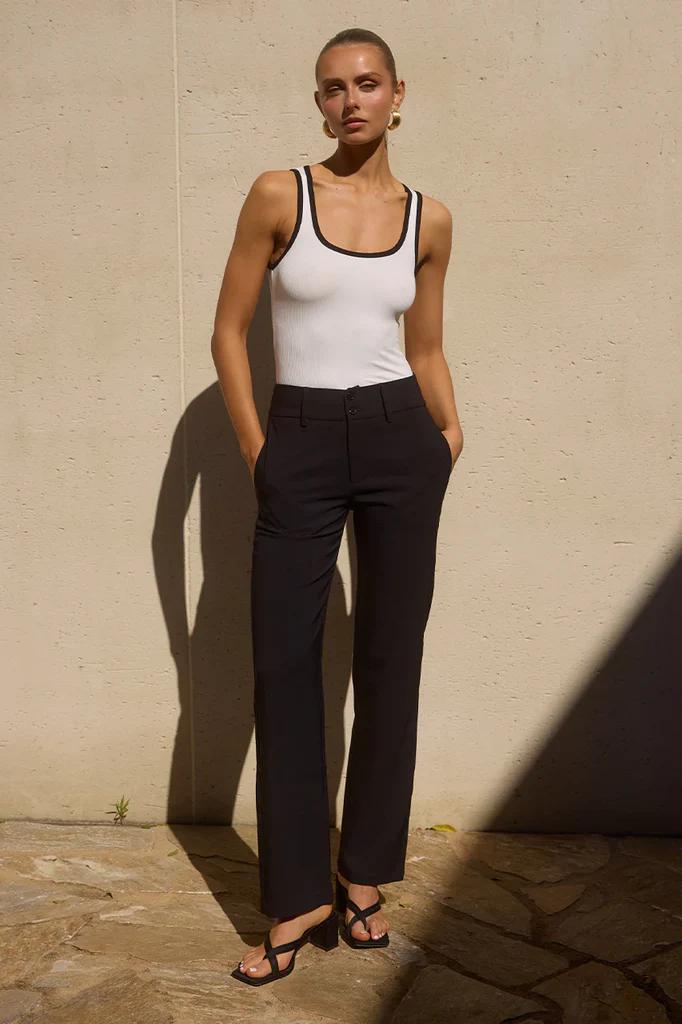 Girl in black trousers