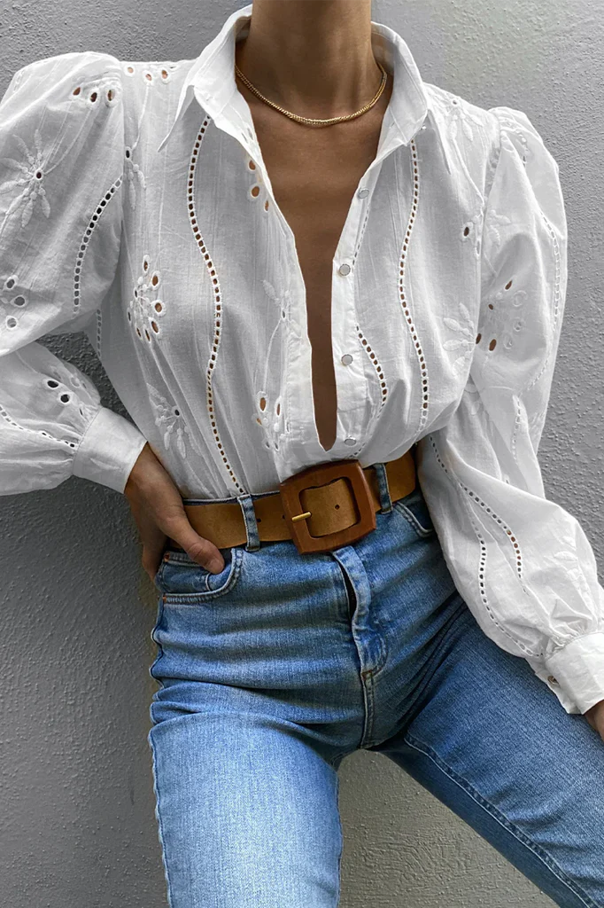 Girl in white blouse and jeans