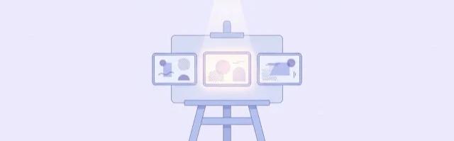 An easel holding three concept frames under a spotlight