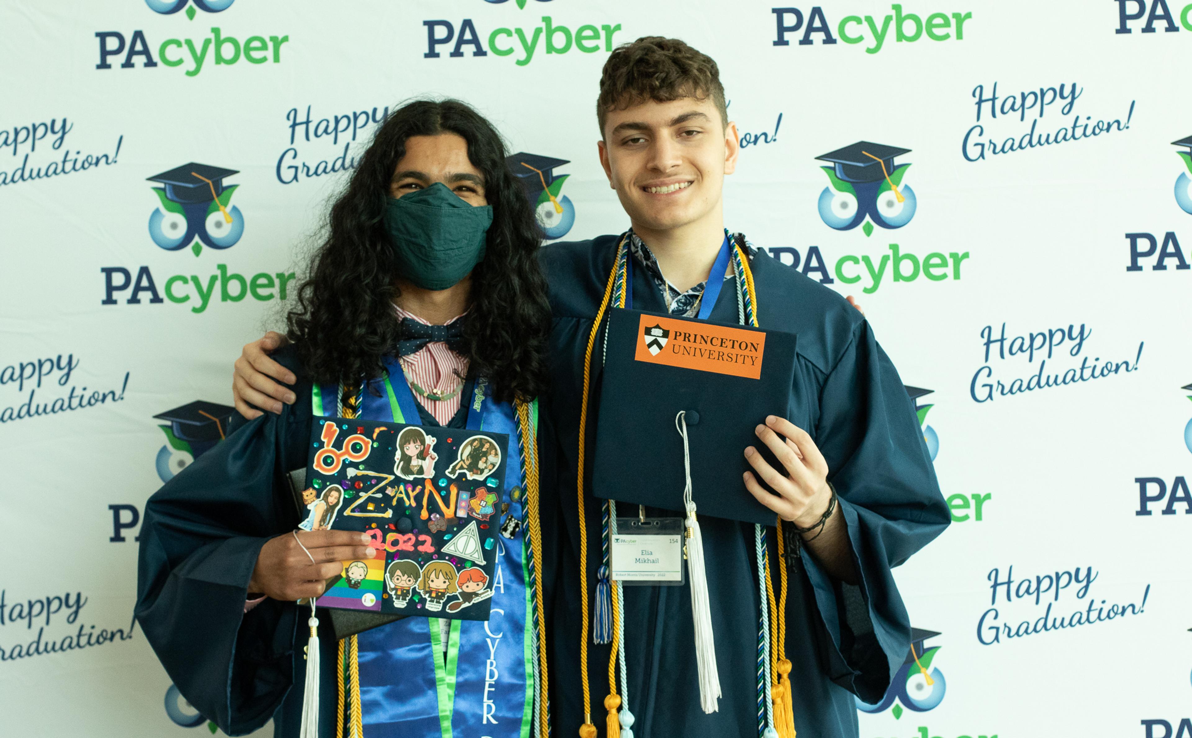 Two students graduating from PA Cyber