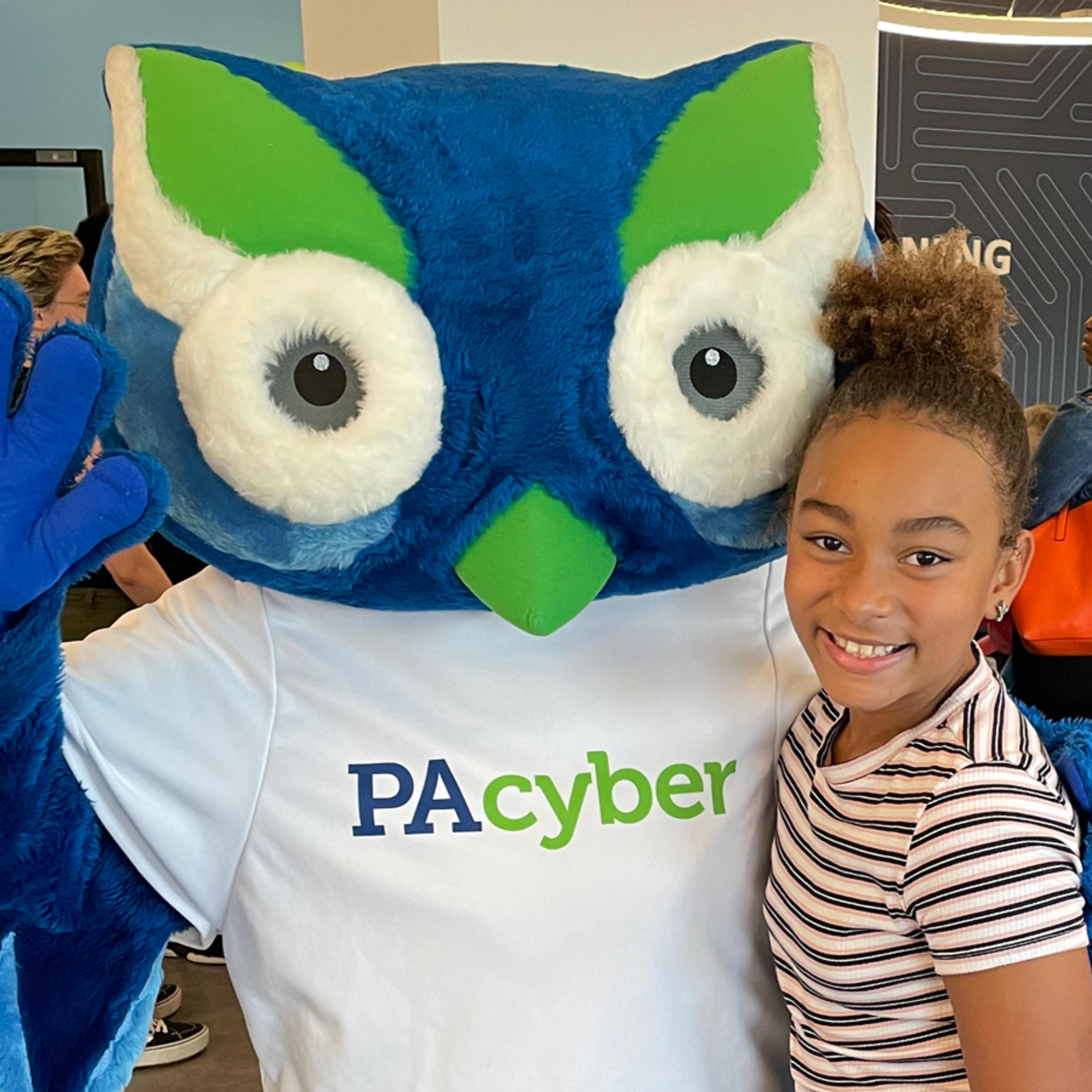 Student with Archie at a kick off event