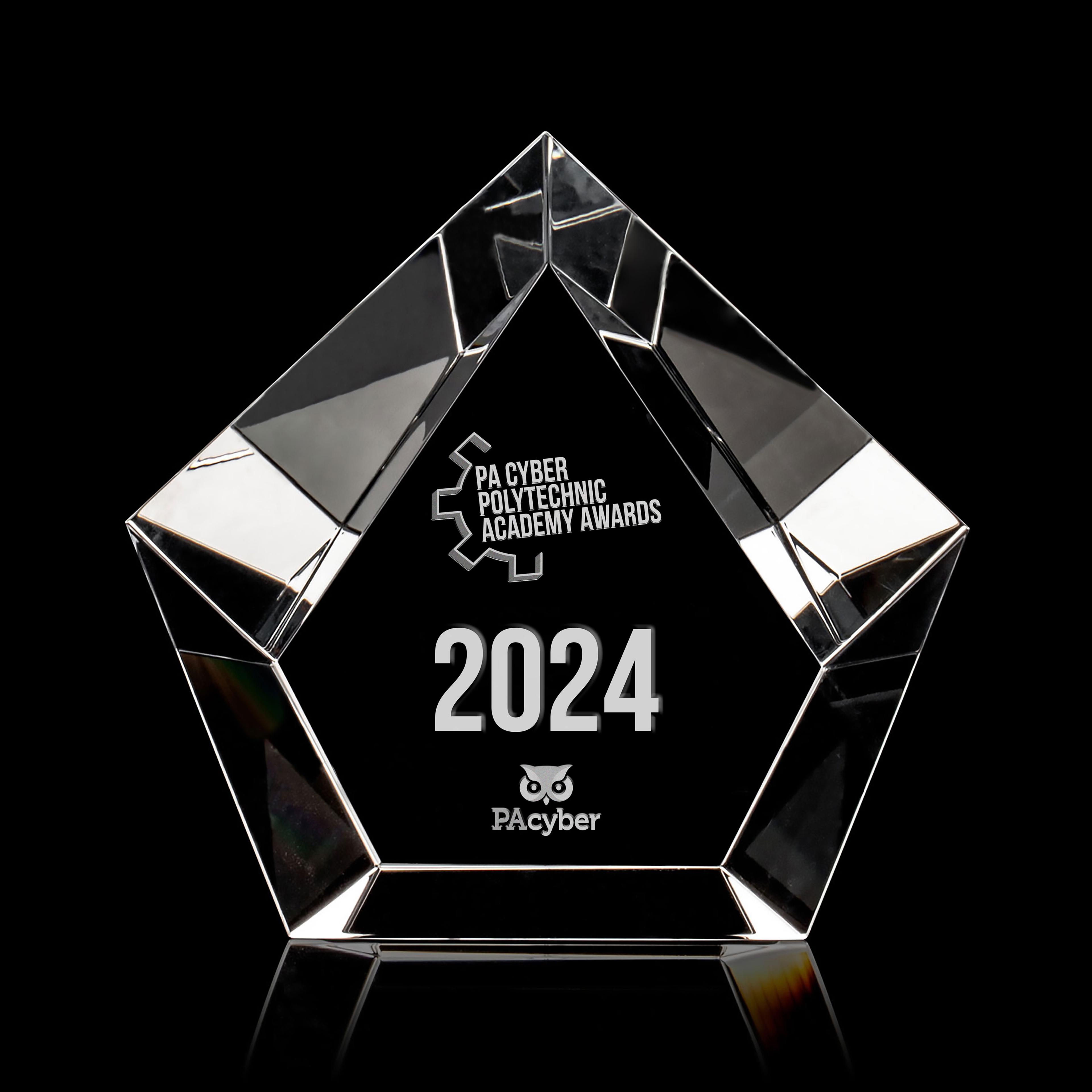The Poly Award is a pentagon-shaped crystal with "PA Cyber Polytechnic Academy Awards" etched into the front.