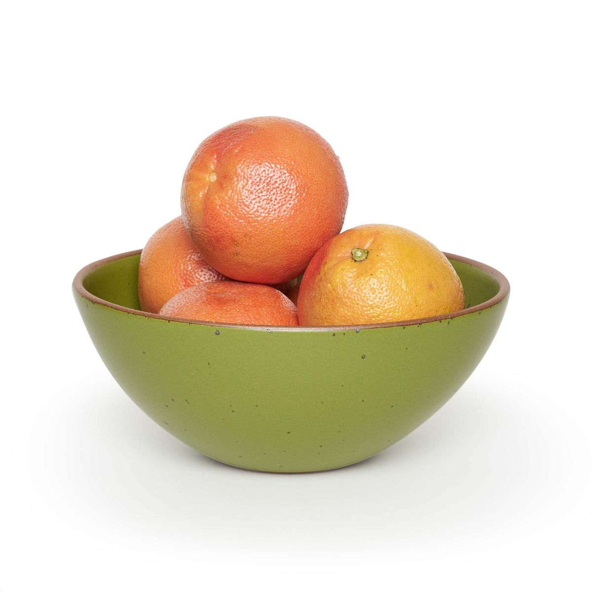 Mixing Bowl in Fiddlehead, a mossy, olive green. Pictured with five large grapefruits.