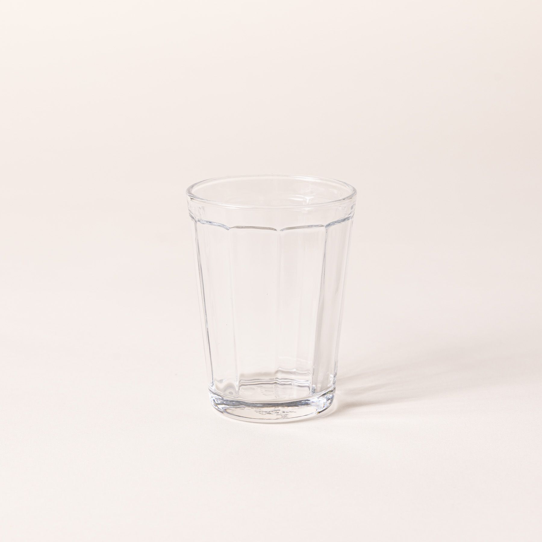 A medium diner-style glass that tapers to be wider at the top