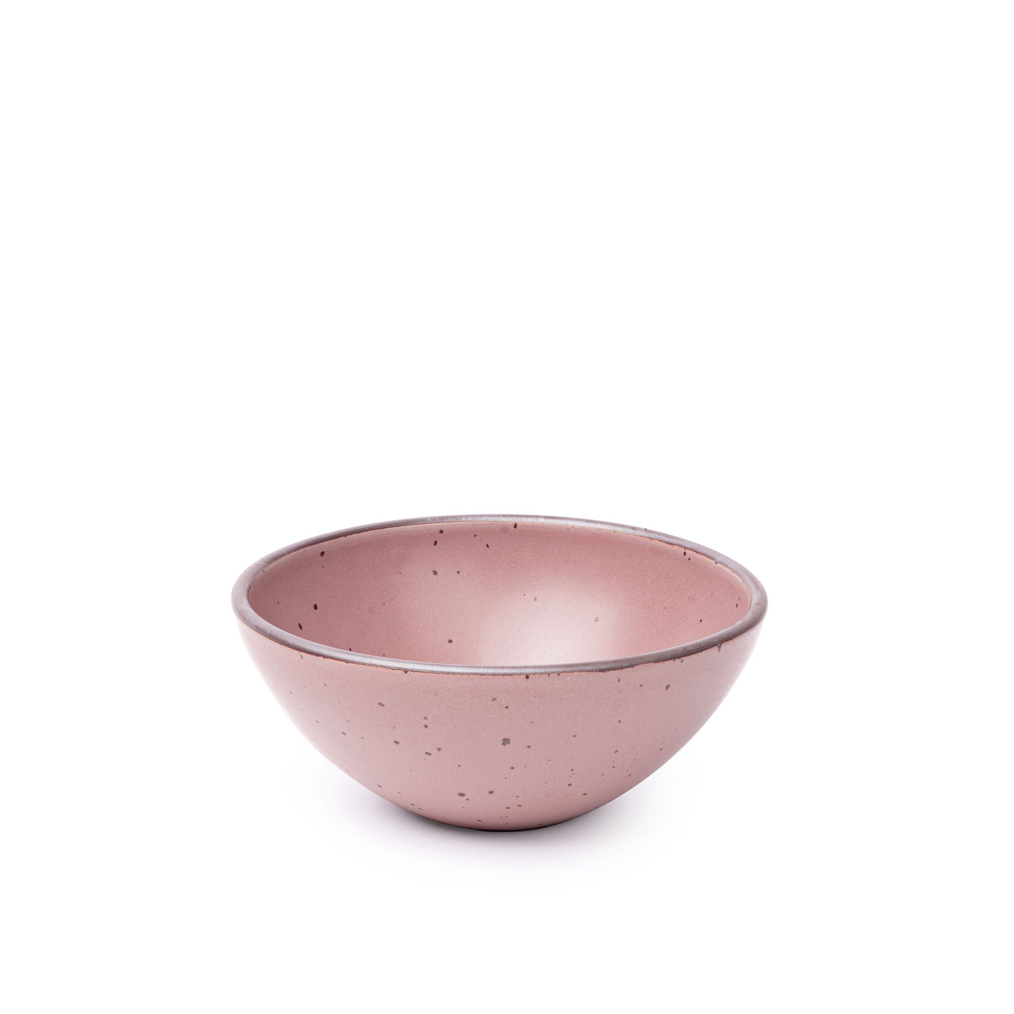 A medium rounded ceramic bowl in a dusty mauve pink color featuring iron speckles and an unglazed rim