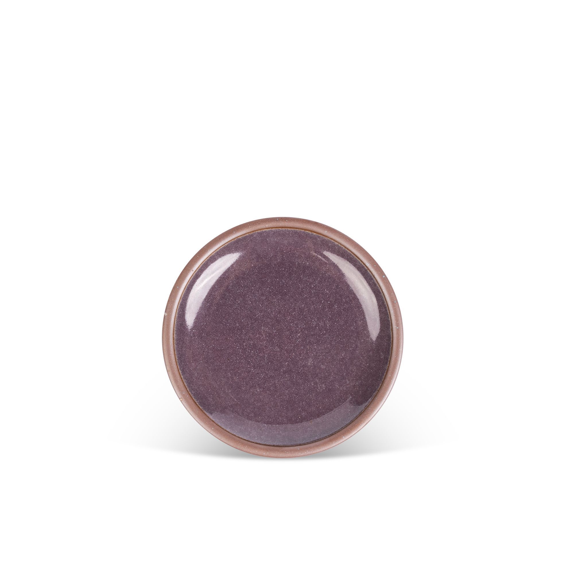 A dessert sized ceramic plate in a purple color with a soft glowing sheen and unglazed rim