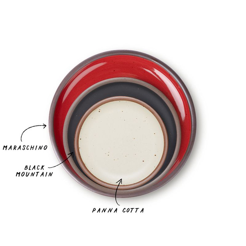 A stack of 3 plates in Dinner, Side, and Cake sizes in a glossy red, graphite black, and off-white colors.