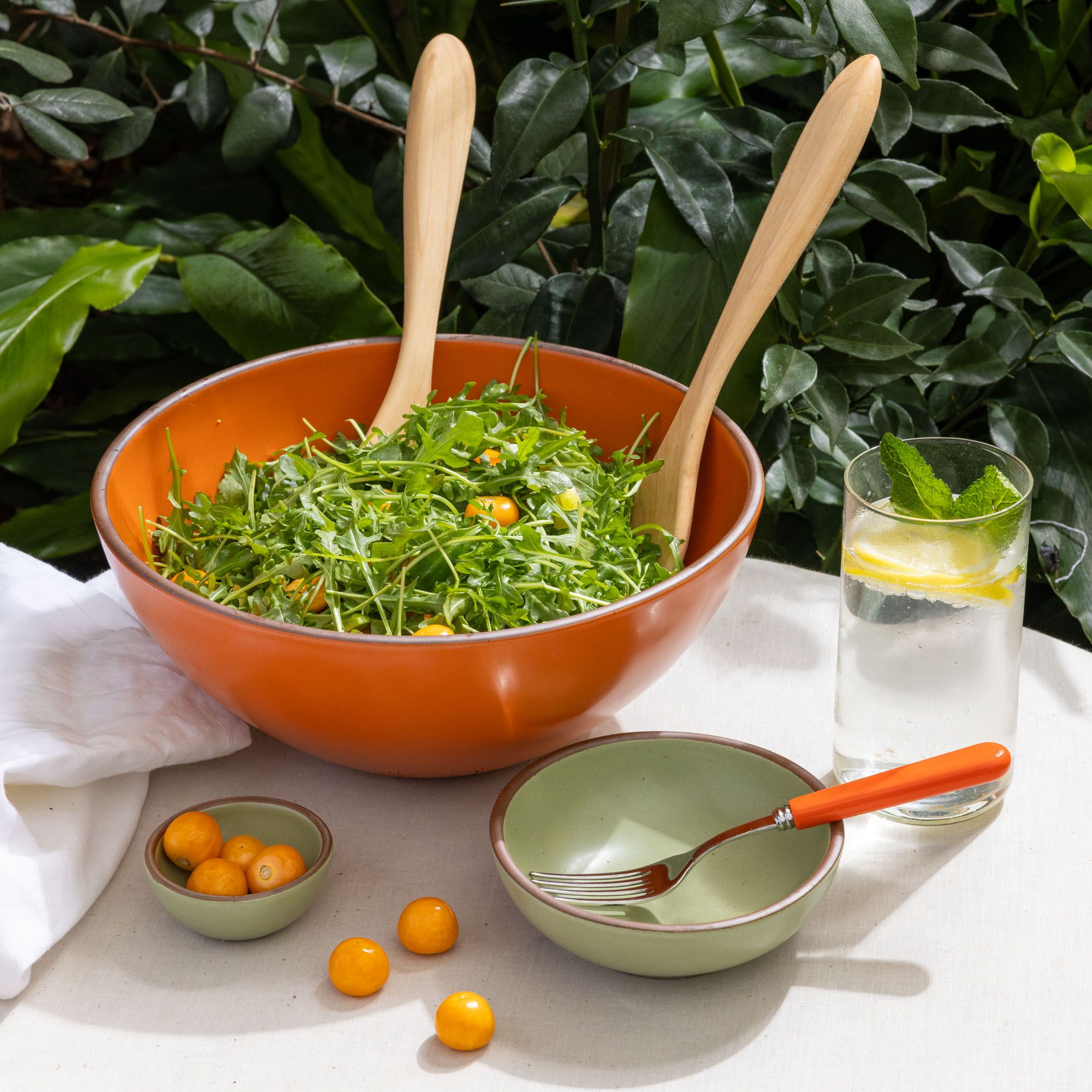 A large ceramic mixing bowl featuring iron speckles and an unglazed rim