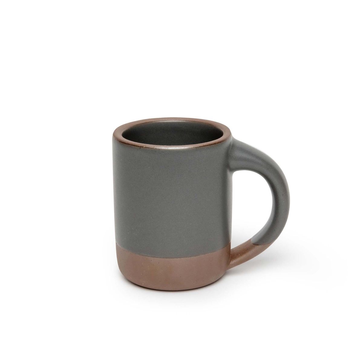 A medium sized ceramic mug with handle in a cool, medium grey color featuring iron speckles and unglazed rim and bottom base.