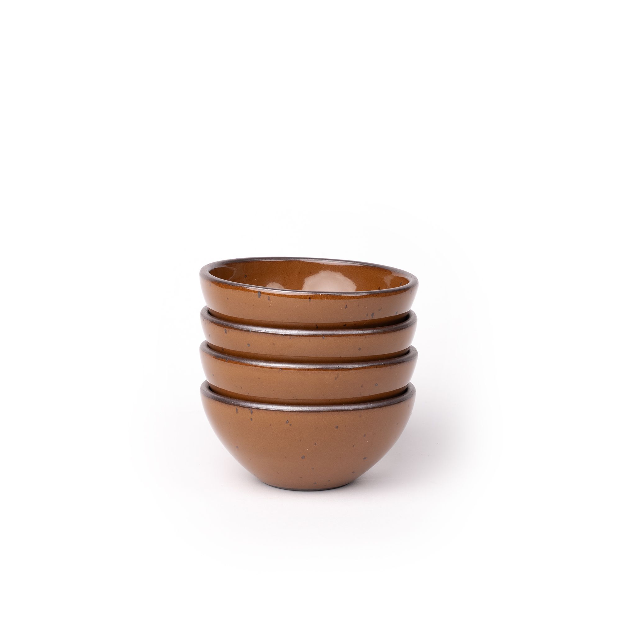 A stack of 4 small dessert sized rounded ceramic bowls in a glossy caramel brown color featuring iron speckles and an unglazed rim