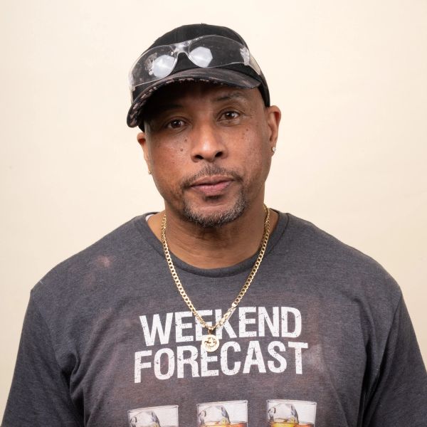 A headshot of Dennis B.