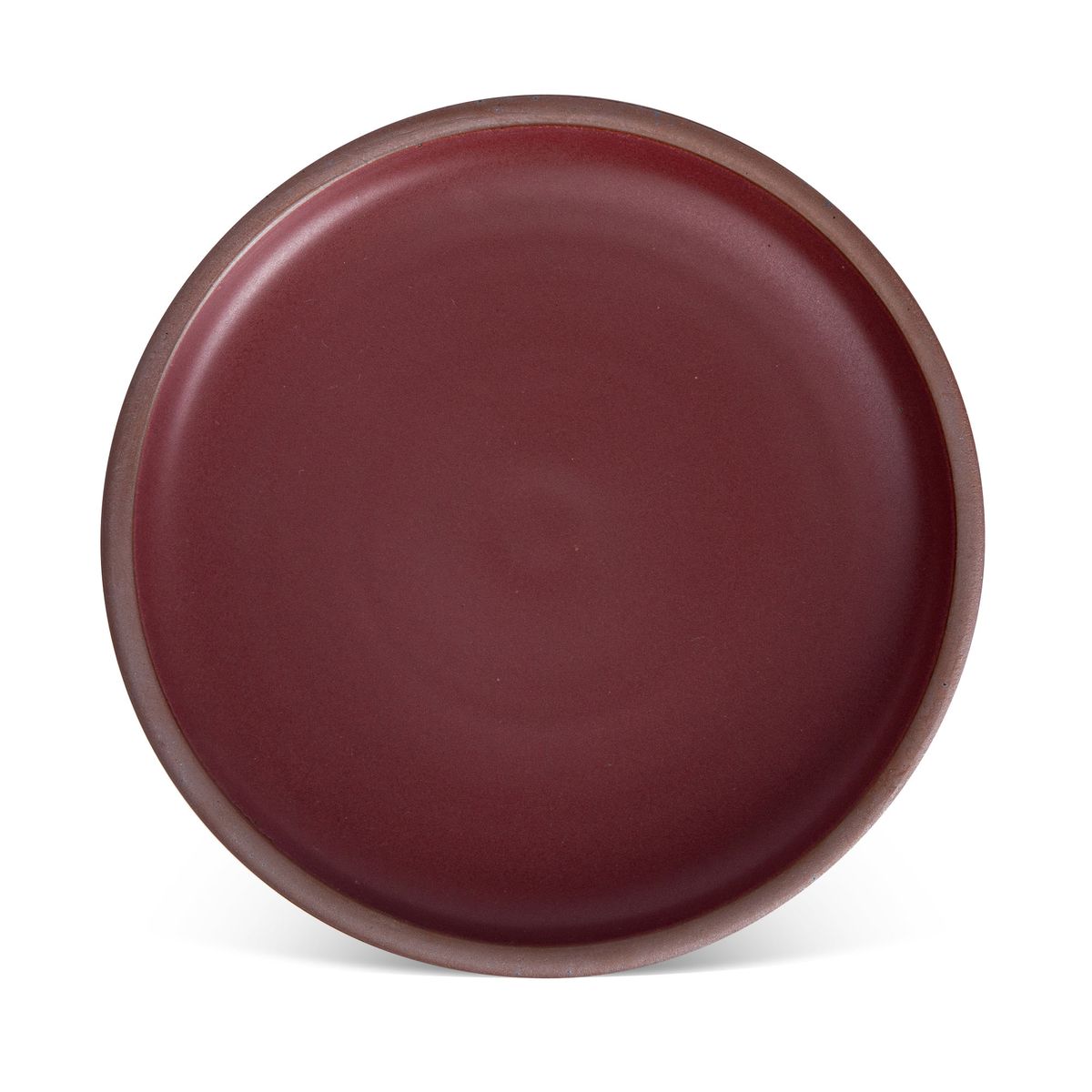 A large ceramic platter in a plum color featuring iron speckles and an unglazed rim