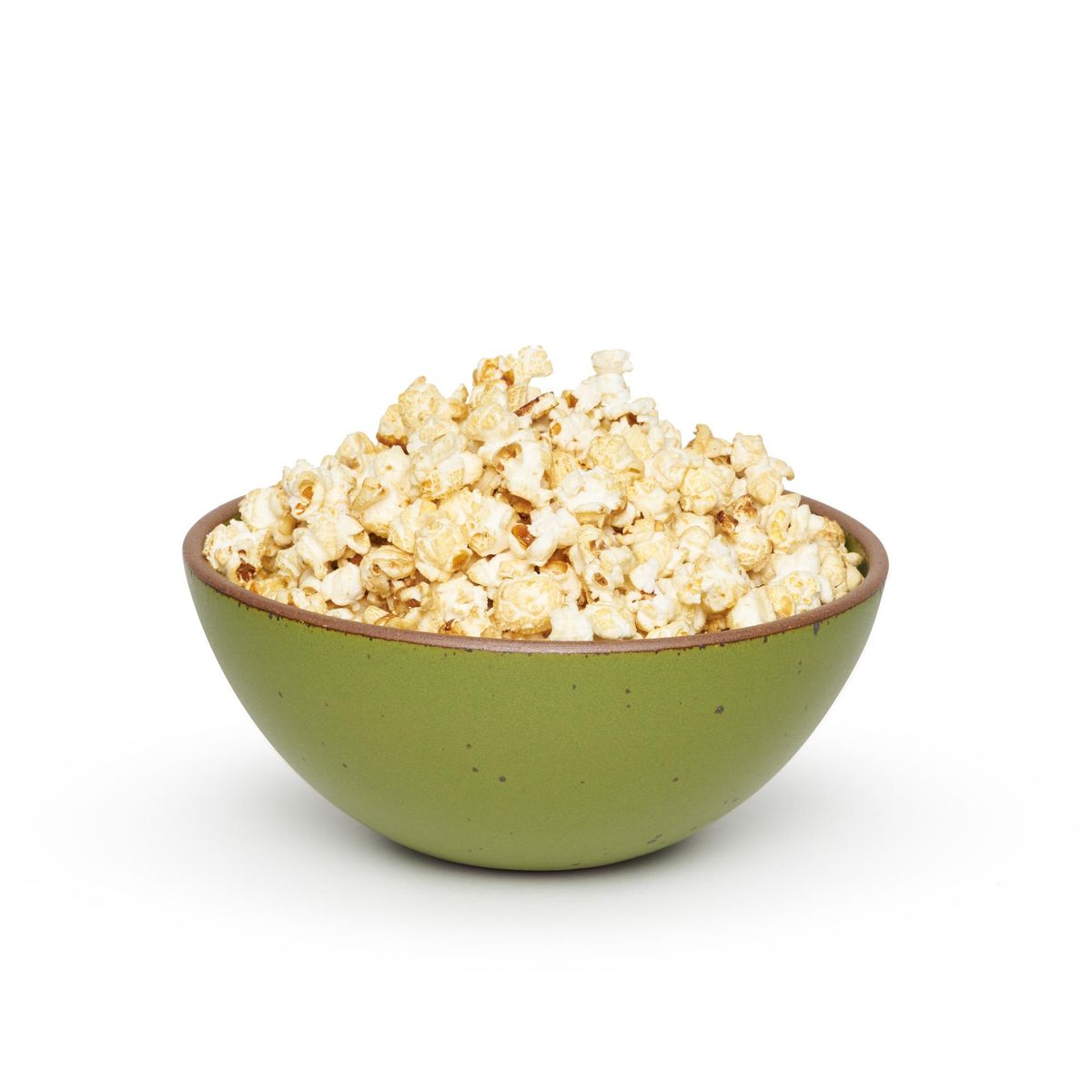Popcorn Bowl in Fiddlehead, a mossy, olive green. Pictured here with a heaping pile of perfectly buttered popcorn.