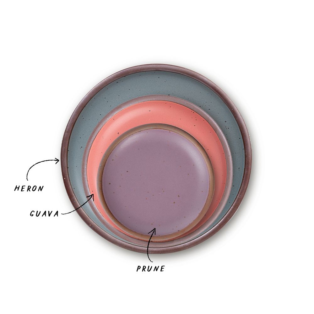 A stack of 3 plates in Dinner, Side, and Cake sizes in a blue-grey, watermelon pink, and soft mauve purple colors.