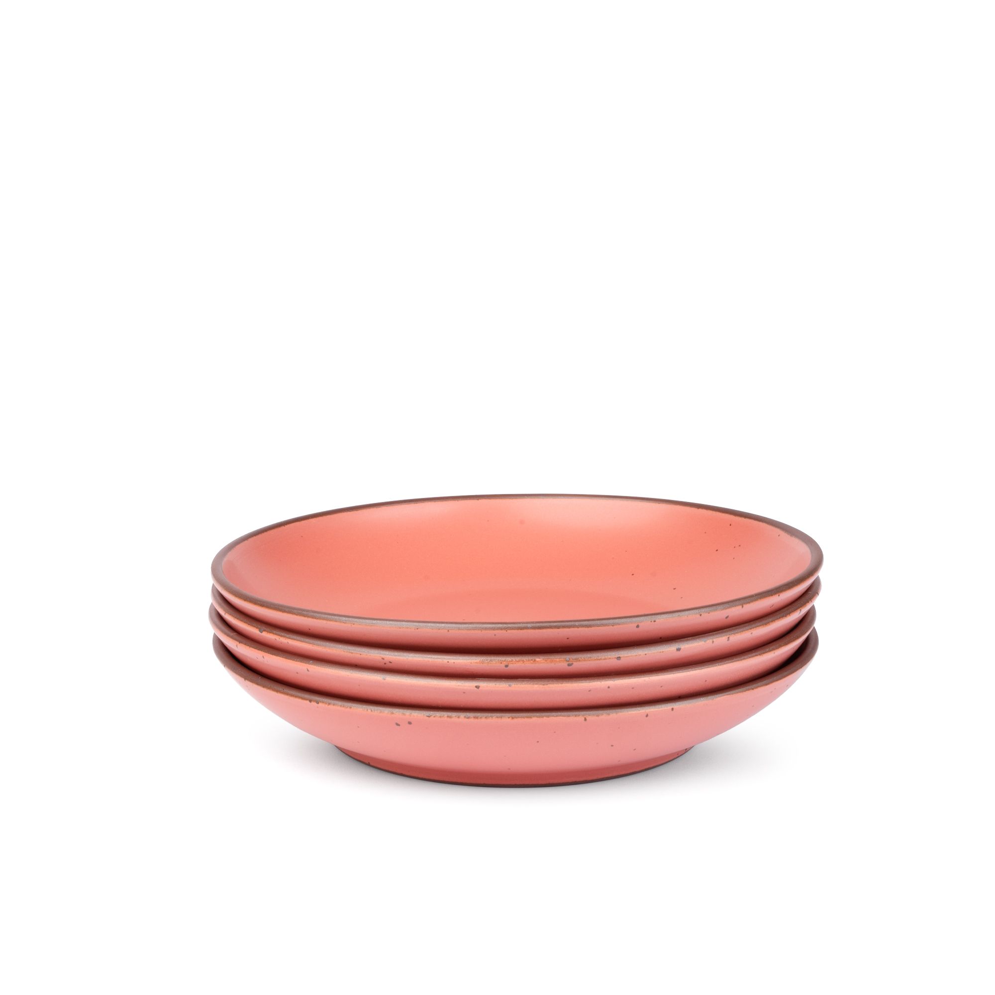A stack of 4 large ceramic plates with a curved bowl edge in a watermelon pink color featuring iron speckles and an unglazed rim.