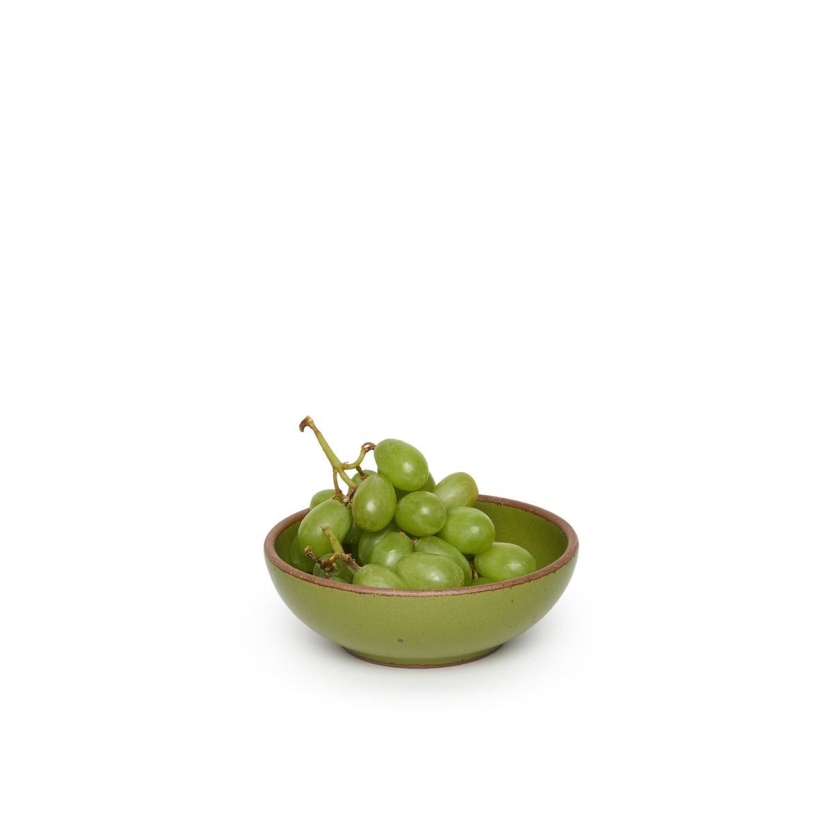 Breakfast Bowl in Fiddlehead, a mossy, olive green. Pictured with green grapes.