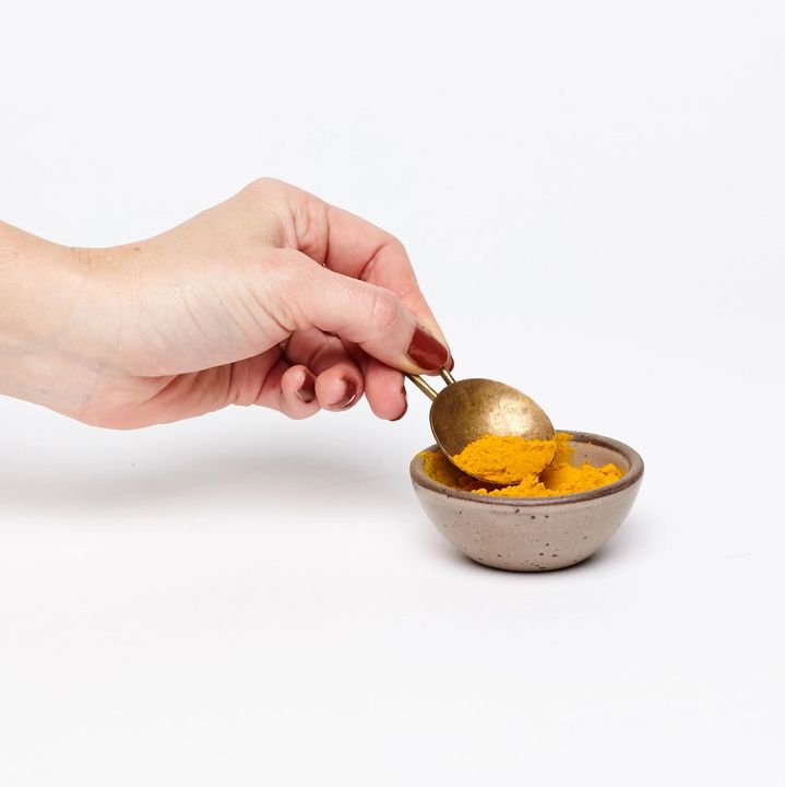 Bitty Bowl with Turmeric and Brass spoon